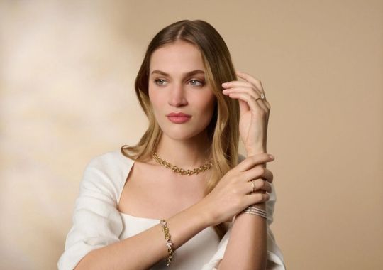 A woman wearing a bracelet.