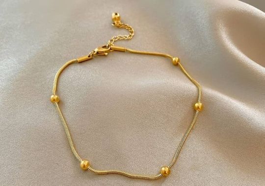 A gold bracelet.