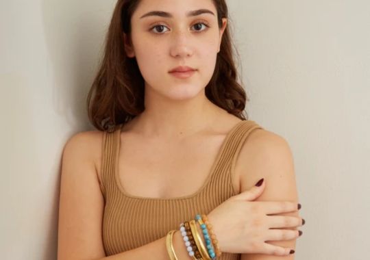 A woman wearing bracelets.