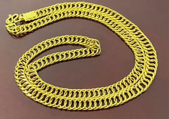Gold Cuban link chain.