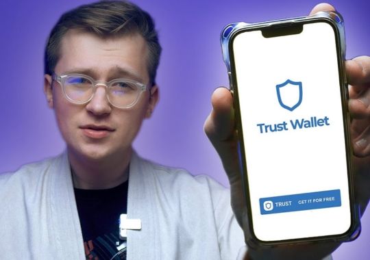 A man installing trust wallet app.