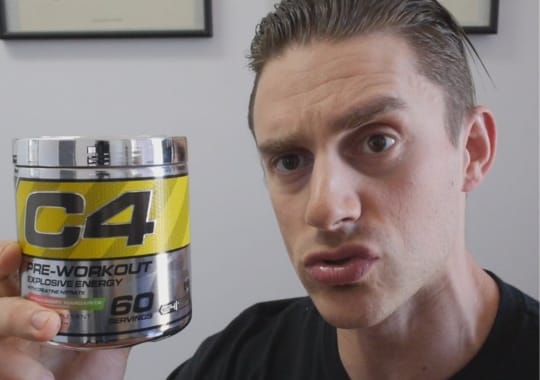 A man holding a c4 pre-workout explosive energy supplement.