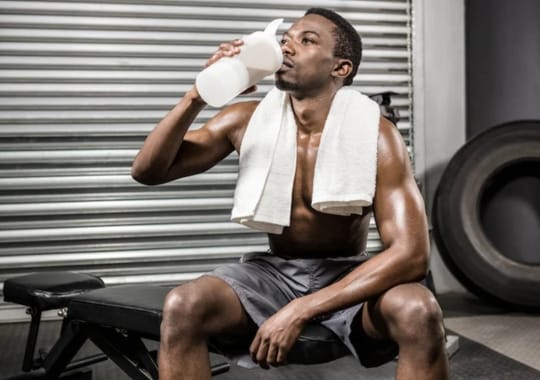 A man drinking why protein.
