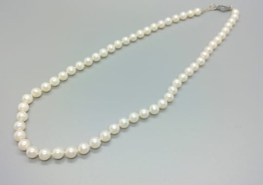 Chanel Pearl Necklace.