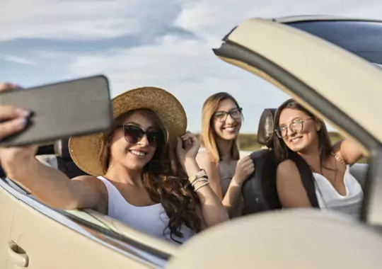 A group of ladies going on a road trip.