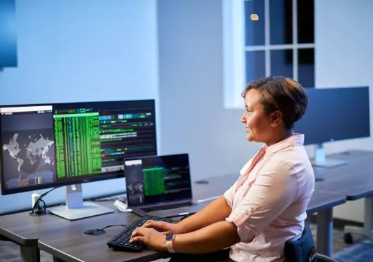 A woman learning online computer science.